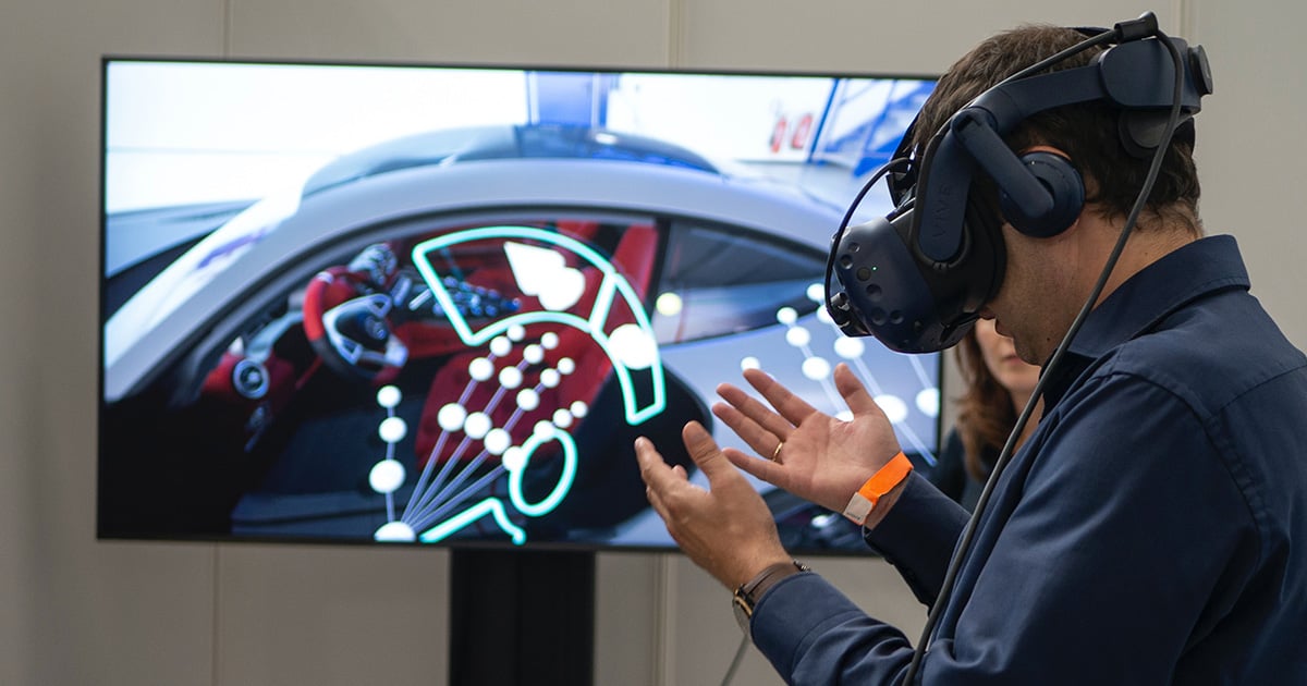 college students wearing a VR headset